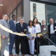 Those on hand for the Restoring Waters ribbon-cutting on Tuesday, May 14, 2024, included, from left, Housing Commissioner Jennifer Leimaile Ho, County Commissioner Rafael Ortega, Mayor Melvin Carter, Project for Pride in Living CEO Paul Williams, and Council Member Saura Jost and Ryan Companies' Tony Barranco, far right. Credit: Aaron Nesheim | Sahan Journal