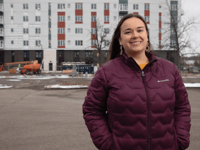 Irene Ruiz-Briseño outside of the Soul apartments in Saint Paul - photo credit Minnesota Women's Press