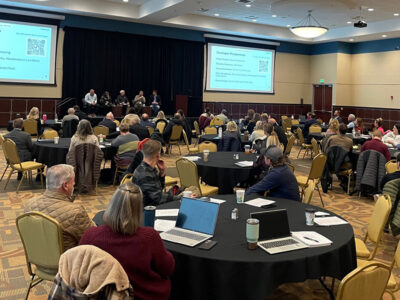 Attendees listening to a presentation during the Beltrami County Housing Roundtable