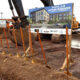 Shovels in a pile of dirt in preparation for the groundbreaking ceremony for the Poplar Apartments in Mankato