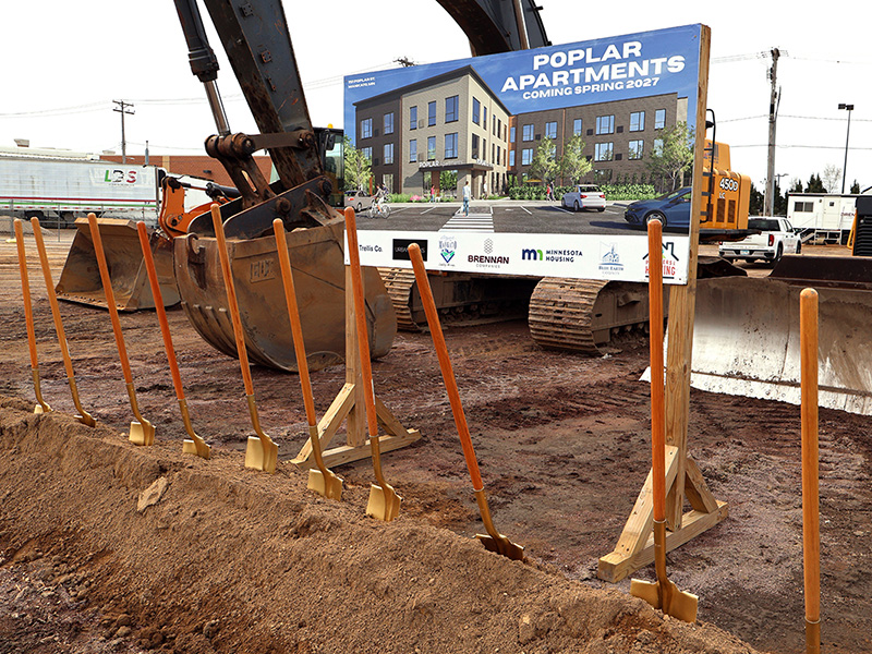 Shovels in a pile of dirt in preparation for the groundbreaking ceremony for the Poplar Apartments in Mankato