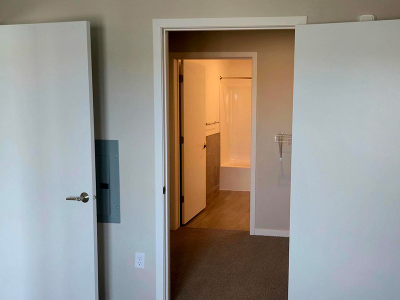 Bedroom, closet, and bathroom in The Williams