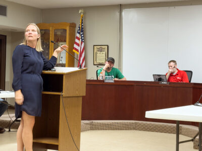 Breanne Kennedy, owner and founder of Thrive Consulting, speaks to Montgomery’s Planning and Zoning Commission at their May meeting about her evaluation of housing in the city. Credit: Jarrod Schoenecker, Montgomery Messenger