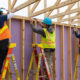 Fairview executive leaders and team members actively building homes with Habitat for Humanity