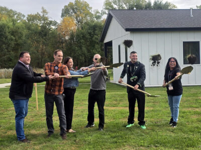 Nate and Irene from the GMHF team with members of the Lower Sioux Indian Community and other partners break ground for a new hempcrete elder home on Tribal land